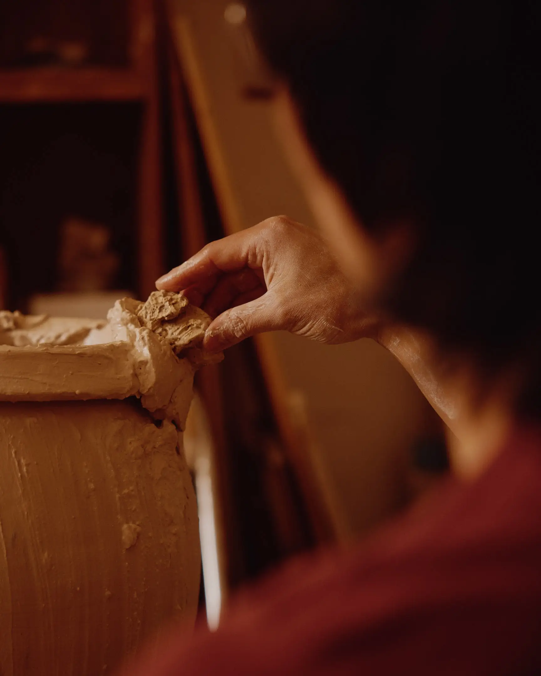 Hand of Jotham Hung, working on pottery. Jotham Hung Ceramics based in Los Angeles, Ca shot originally for NAN Collective.